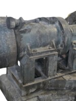 Side view of preowned 8-inch rubber strainer extruder machine with 60 HP motor