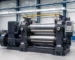 Industrial two-roll rubber mixing mill in a modern rubber-processing workshop