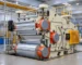 Industrial Rotocure rotary curing machine in a rubber manufacturing workshop