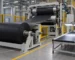 Illustration of a rubber calender fabric-coating line and sample bench