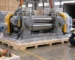 Illustration of a rubber mixing mill being prepared for export inspection