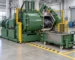 Illustrative rubber dispersion kneader discharge zone and receiving trolley