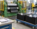 Illustrative mixing mill with rubber sheet stacks and batch identification cards