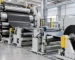 Rubber calendar machine with web guiding and downstream winding equipment